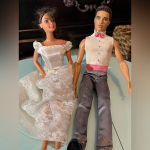 Barbie brunette and Ken dolls in groom and bride dress